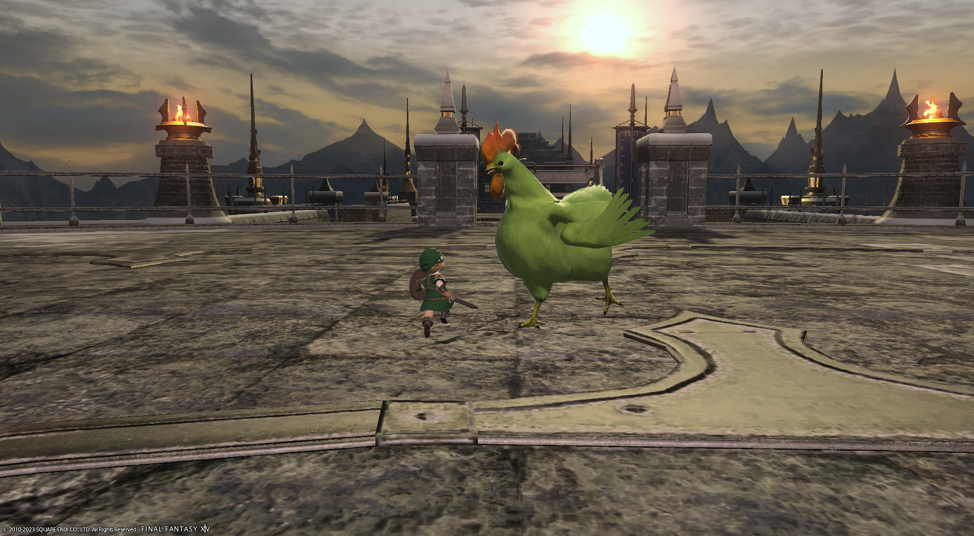 A screenshot from FFXIV.  In the shot is a Lalafell dressed as Link from the Legend of Zelda, alongside a giant green chicken that is an enemy in the Battle of the Big Bridge trial.